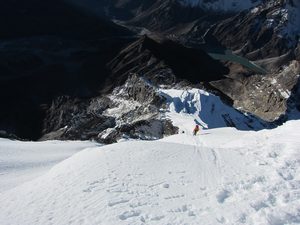 Martin, Jo and Dave on the fixed line, with the route across the glacier visible far below Martin, Jo and Dave on the fixed line, with the route across the glacier visible far below